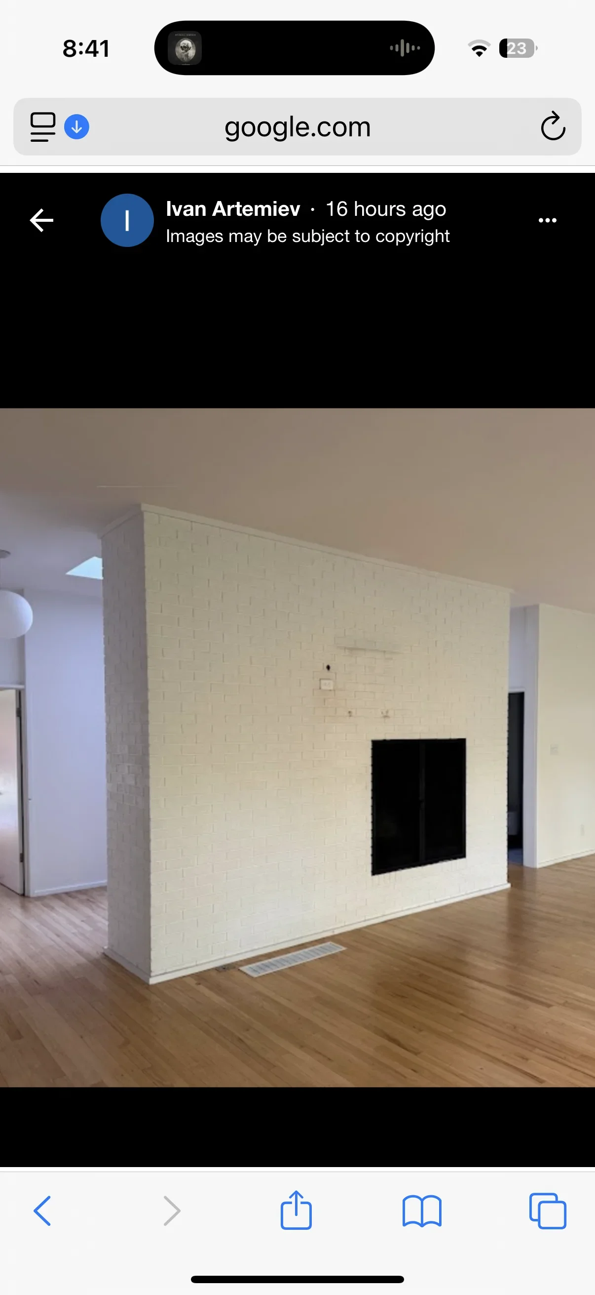 Sandblasted brick wall interior with white masonry exposed and black opening cutout